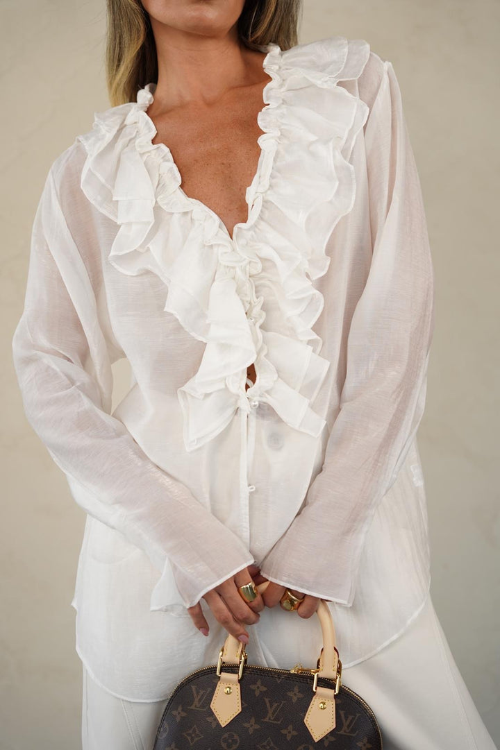 חולצה מכופתרת בגזרת אוברסייז לנשים - דגם דורין בצבעים שחור, לבן וצהוב