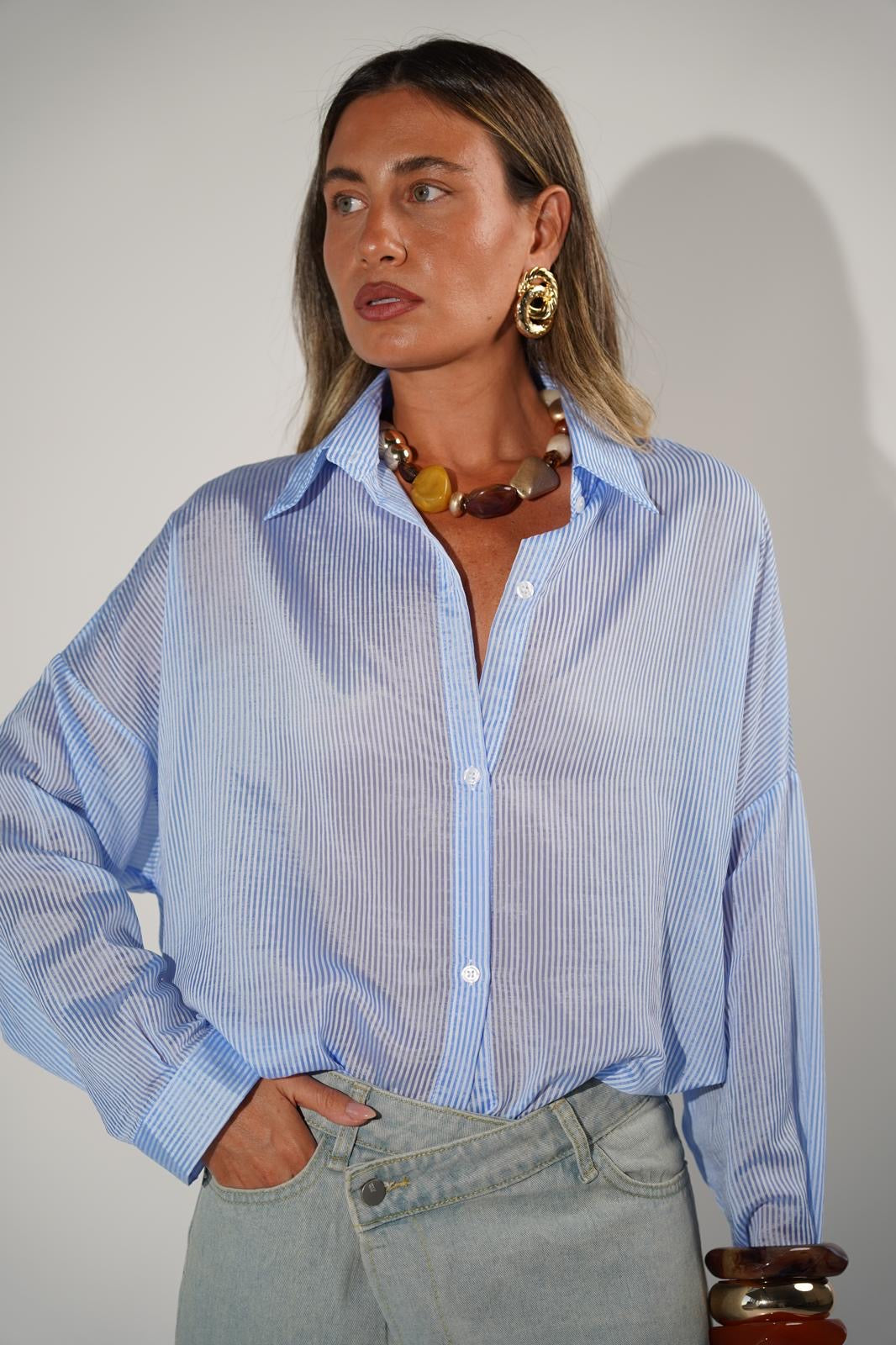 חולצה מכופתרת שקפקפה לנשים - דגם נטע בצבעים ורוד פסים, צהוב פסים, תכלת פסים וקרם פסים